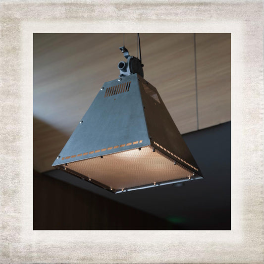 Officina tapered metal pendant light in an interior
